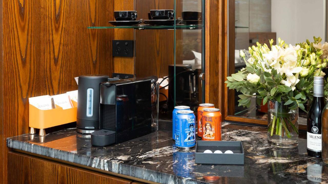 Horizon By Skycity Auckland Exteriör bild A Nespresso coffee machine in a hotel room